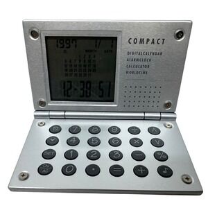 VINTAGE NEWMARK COMPACT Brand Digital Databank [New Battery]‎